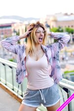outdoor-positive-spring-portrait-happy-blonde-stylish-woman-wearing-trendy-clothes-sport-fitne...jpg