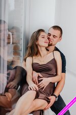 man-pregnant-woman-are-sitting-windowsill-hugging-each-other_644451-1017.jpg